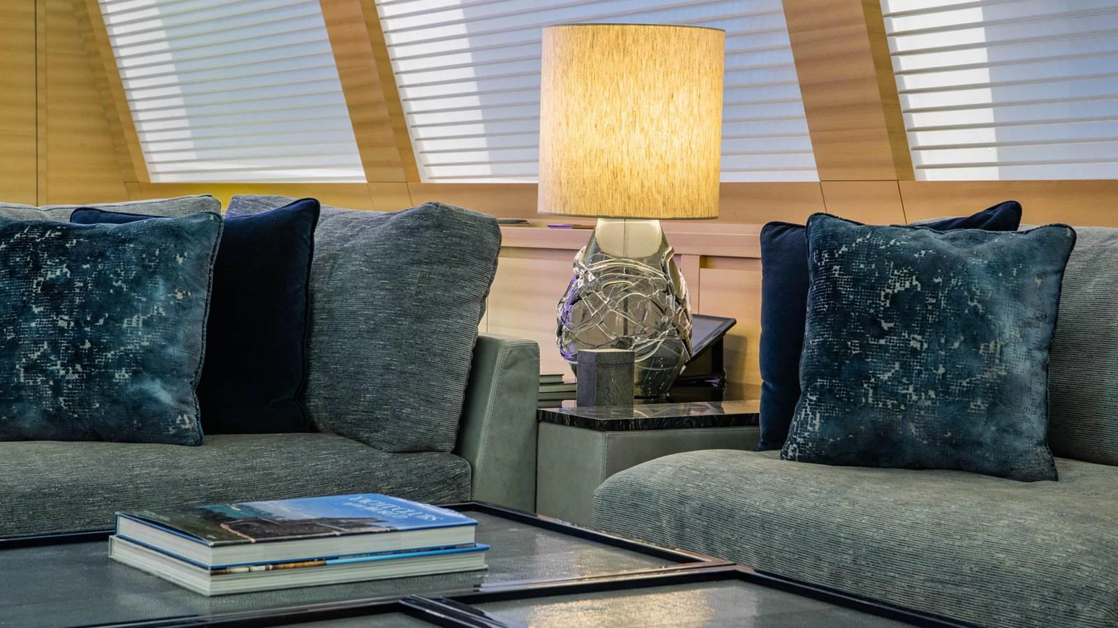 a couch with a lamp on top aboard APRICITY Yacht for Sale