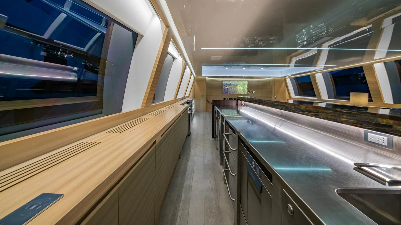 a kitchen with stainless steel appliances aboard APRICITY Yacht for Sale