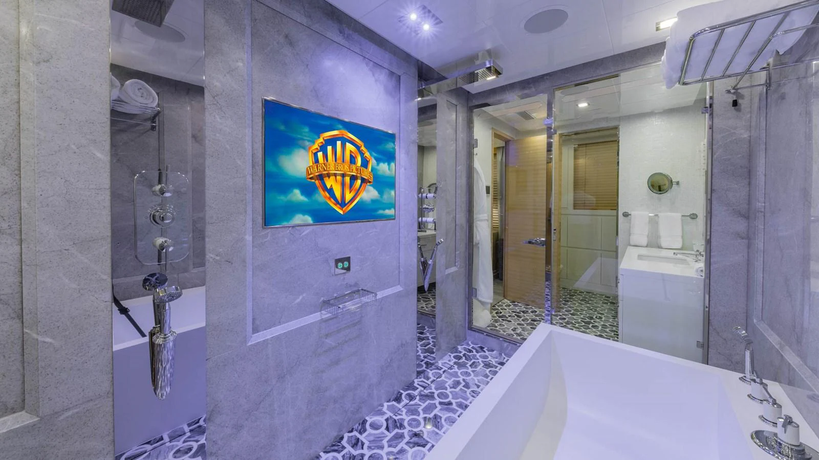 a bathroom with a tub and shower aboard APRICITY Yacht for Sale
