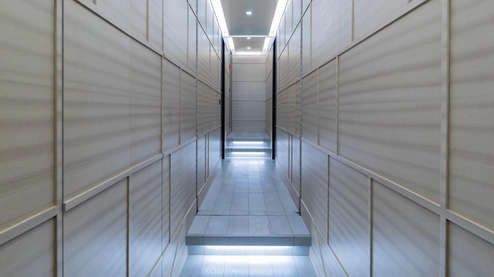 a hallway with a light aboard APRICITY Yacht for Sale