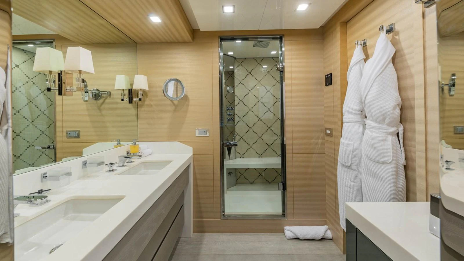 a bathroom with a glass shower aboard APRICITY Yacht for Sale