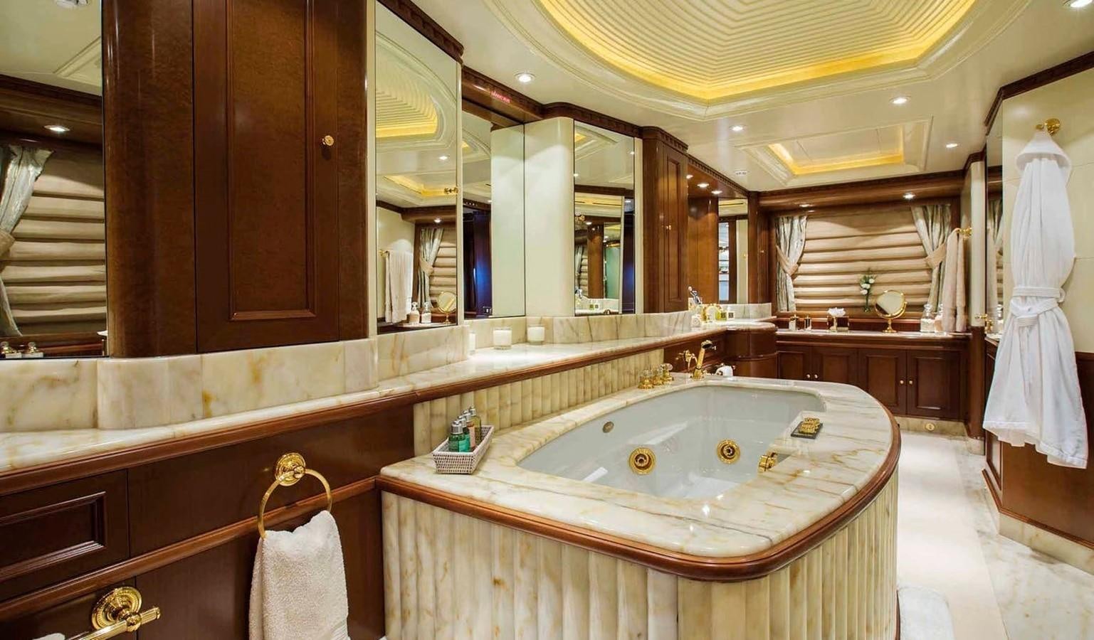 a bathroom with a large bathtub aboard COME PRIMA Yacht for Charter