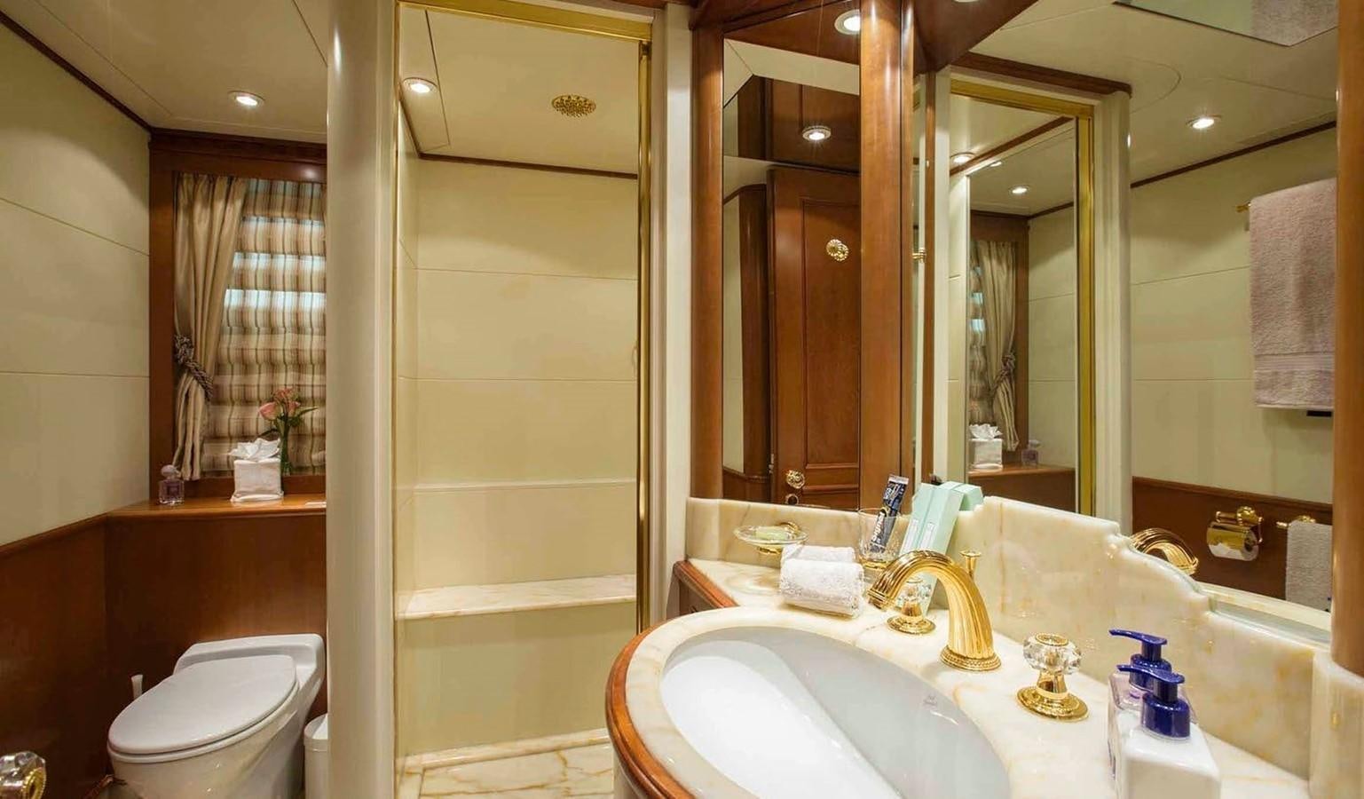 a bathroom with a glass shower aboard COME PRIMA Yacht for Charter