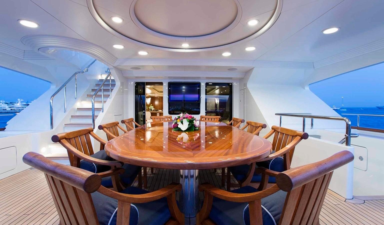 a dining table in a house aboard COME PRIMA Yacht for Sale
