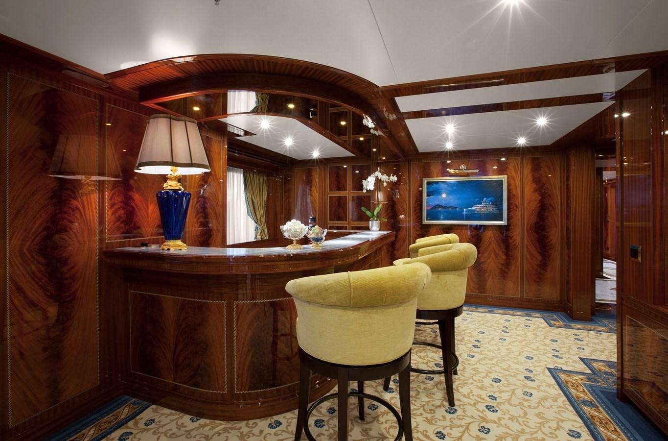 a room with a table and chairs aboard KADIMO'S Yacht for Sale