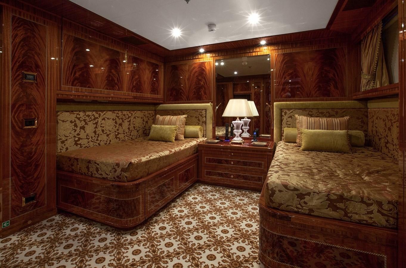 a couple of beds in a room aboard KADIMO'S Yacht for Sale
