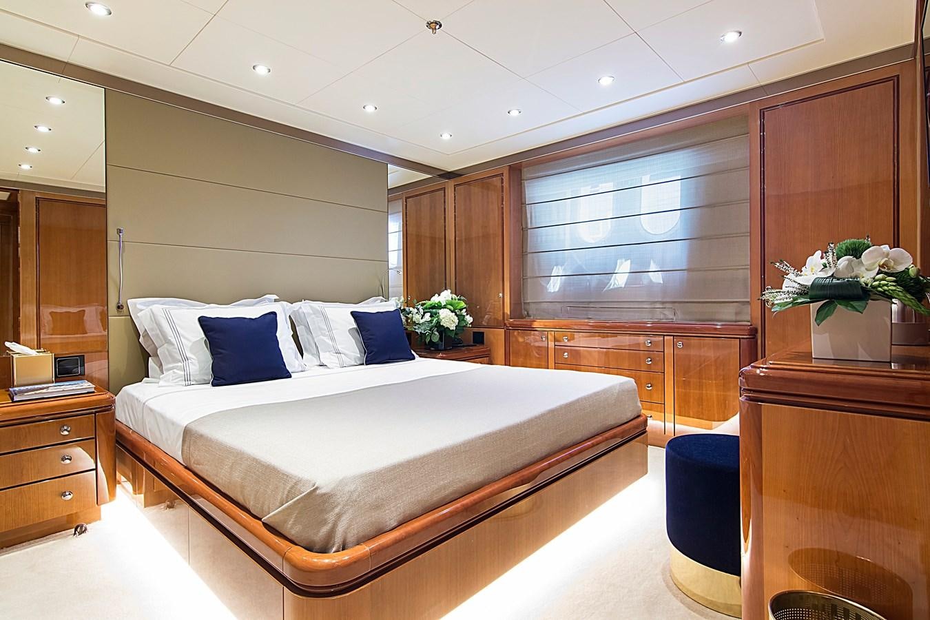 a bed in a room aboard INVADER Yacht for Sale