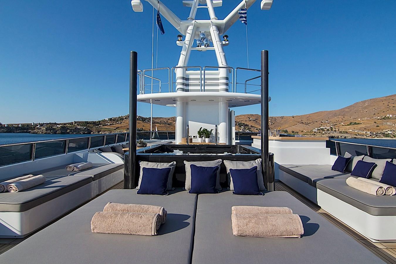 a deck with a large white slide aboard INVADER Yacht for Sale