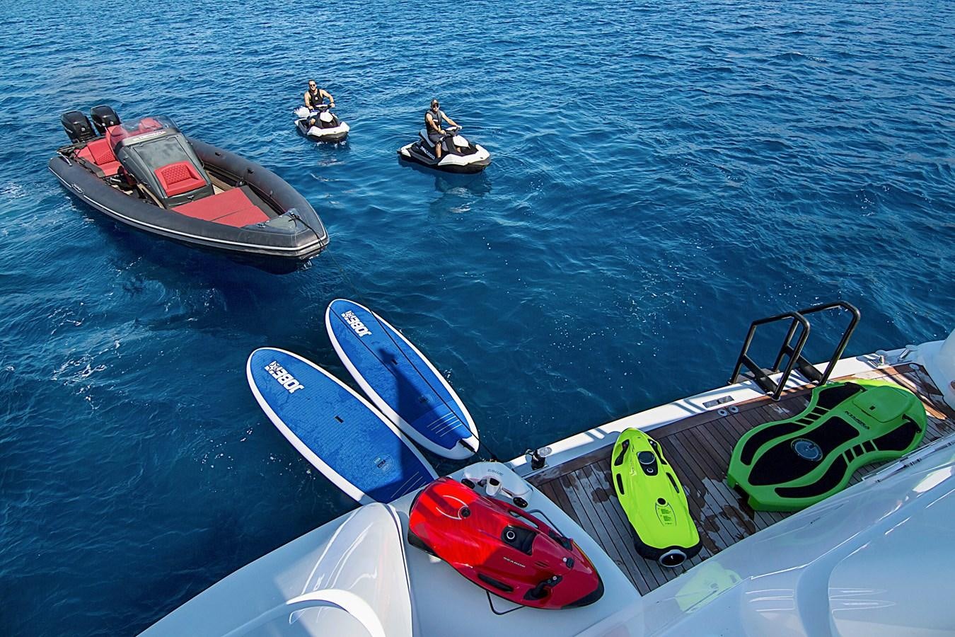 a group of boats in the water aboard INVADER Yacht for Sale