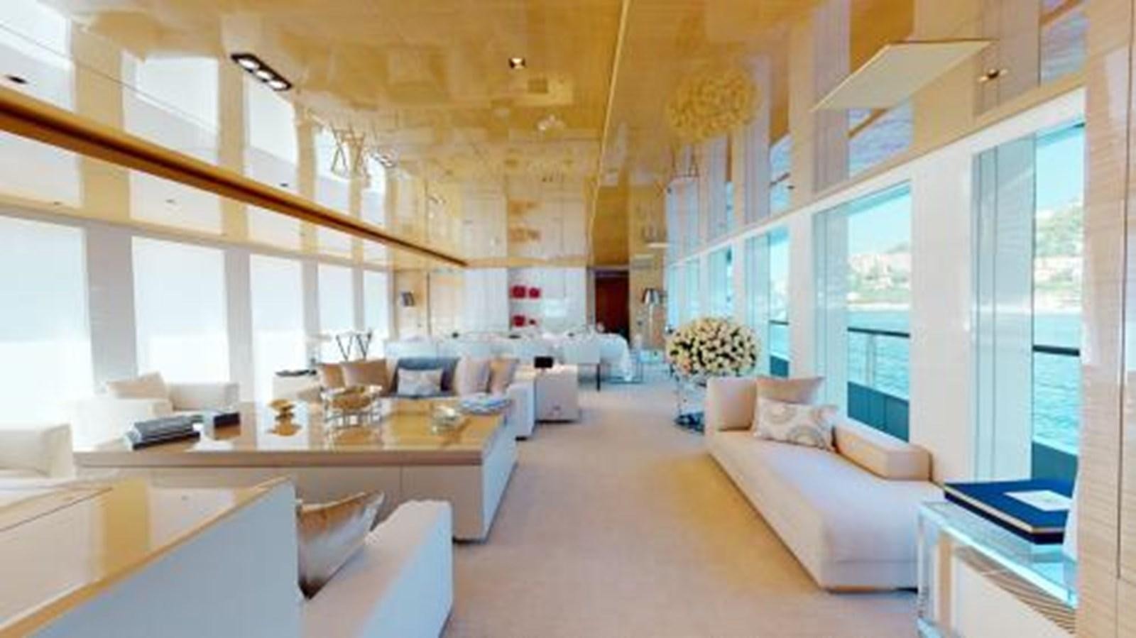 a large living room with a large open window aboard LA PELLEGRINA 1 Yacht for Sale