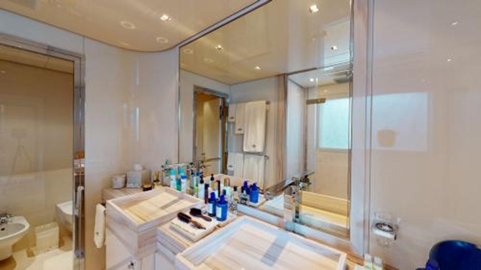 a bathroom with a large mirror aboard LA PELLEGRINA 1 Yacht for Sale
