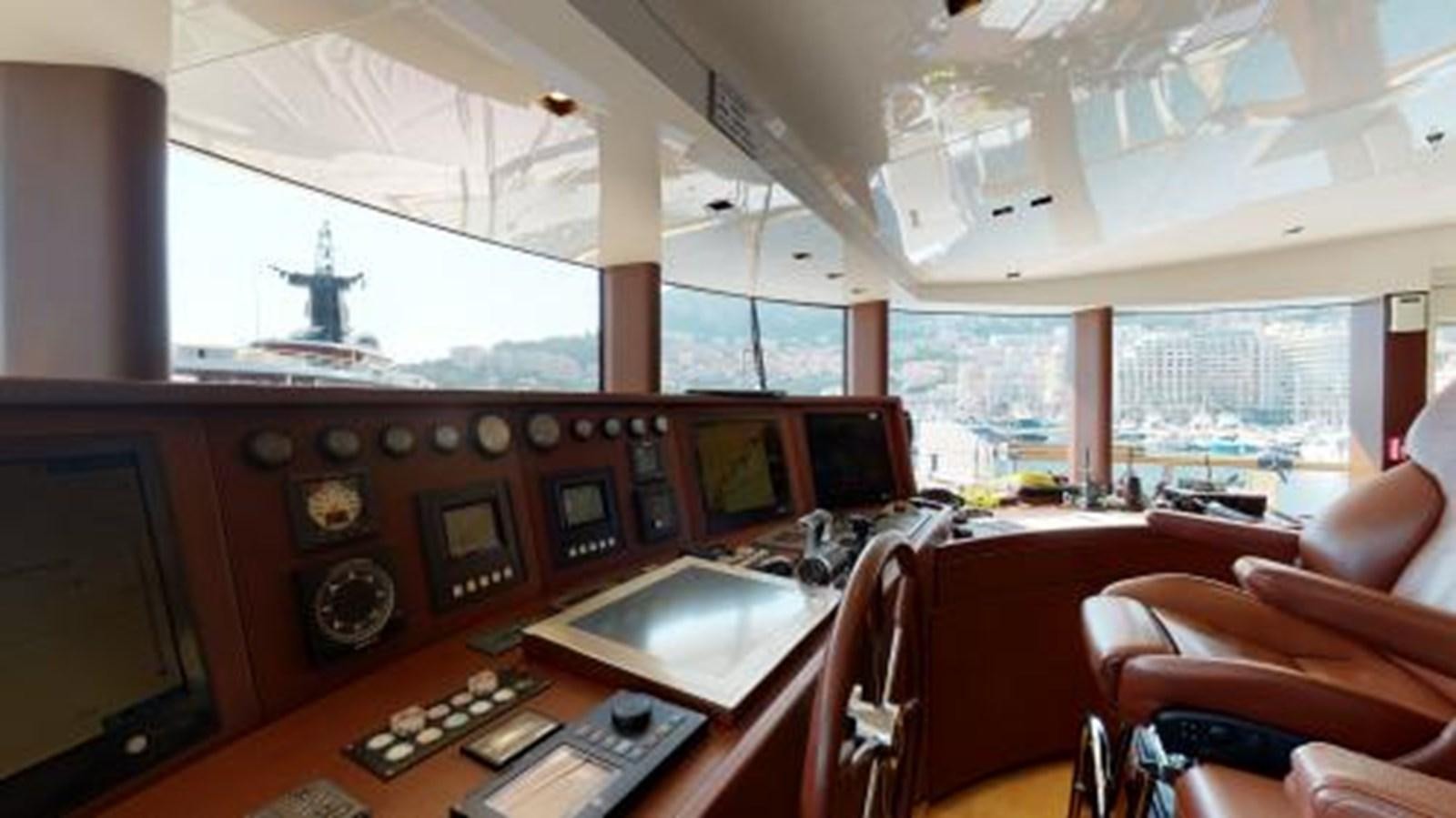 a room with a desk and chairs aboard LA PELLEGRINA 1 Yacht for Sale