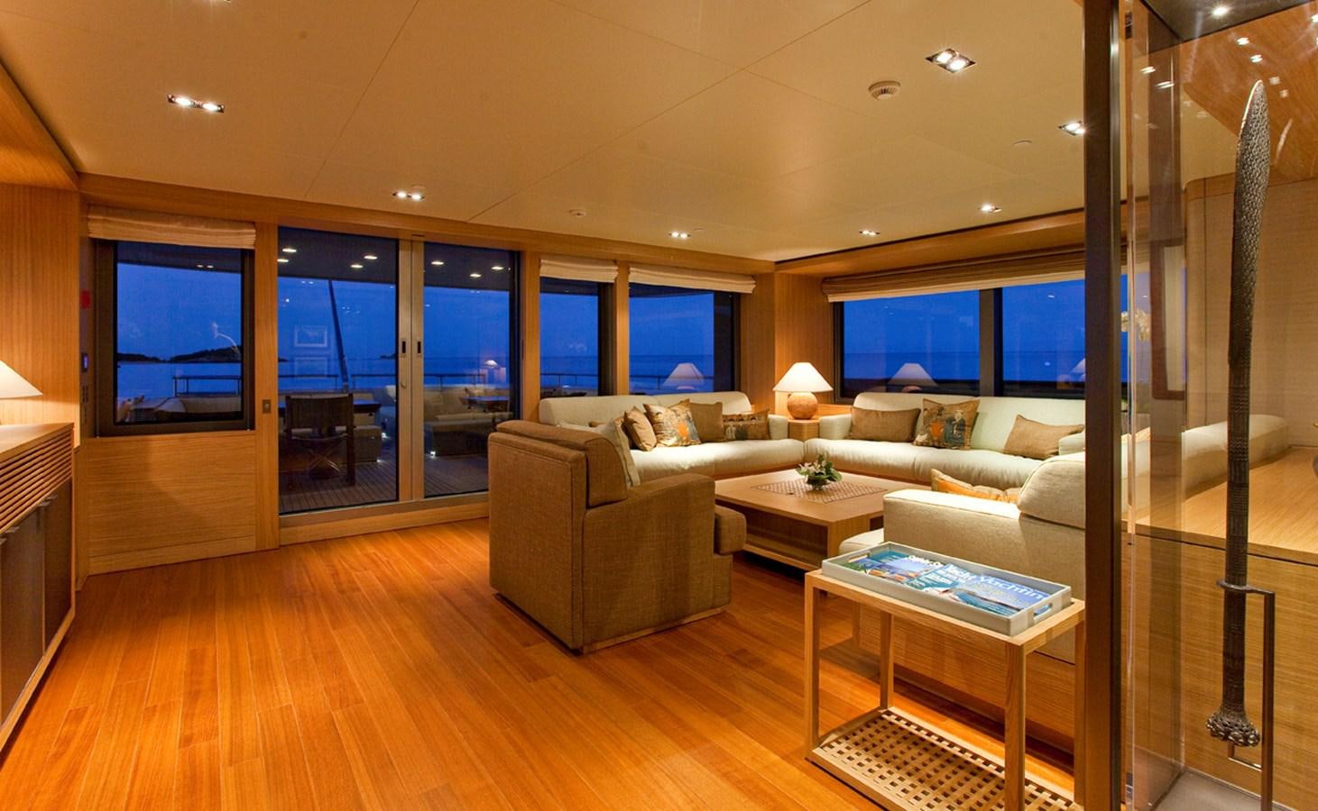 a living room with a wood floor aboard FALCO MOSCATA Yacht for Sale