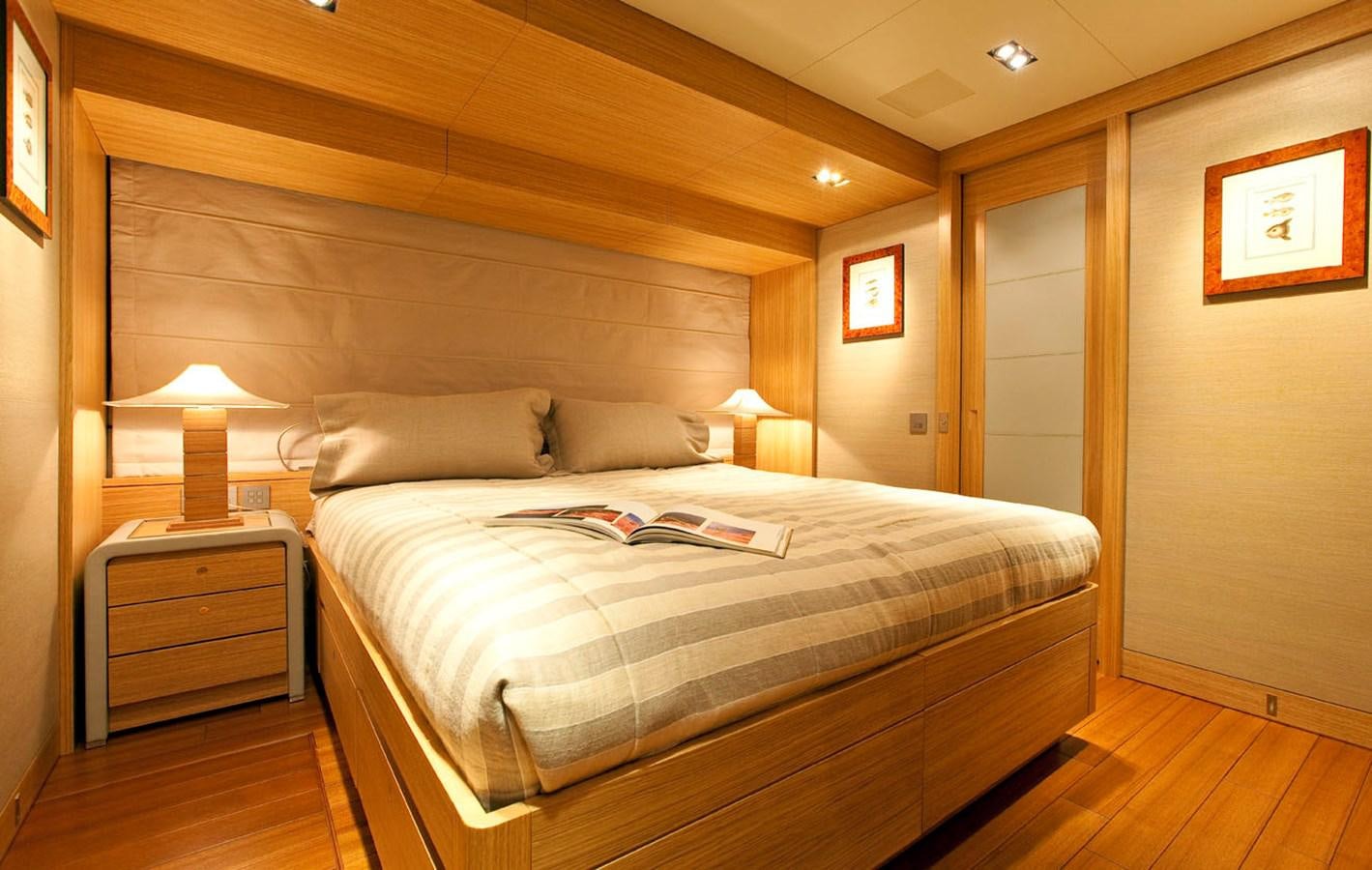 a bed in a room aboard FALCO MOSCATA Yacht for Sale