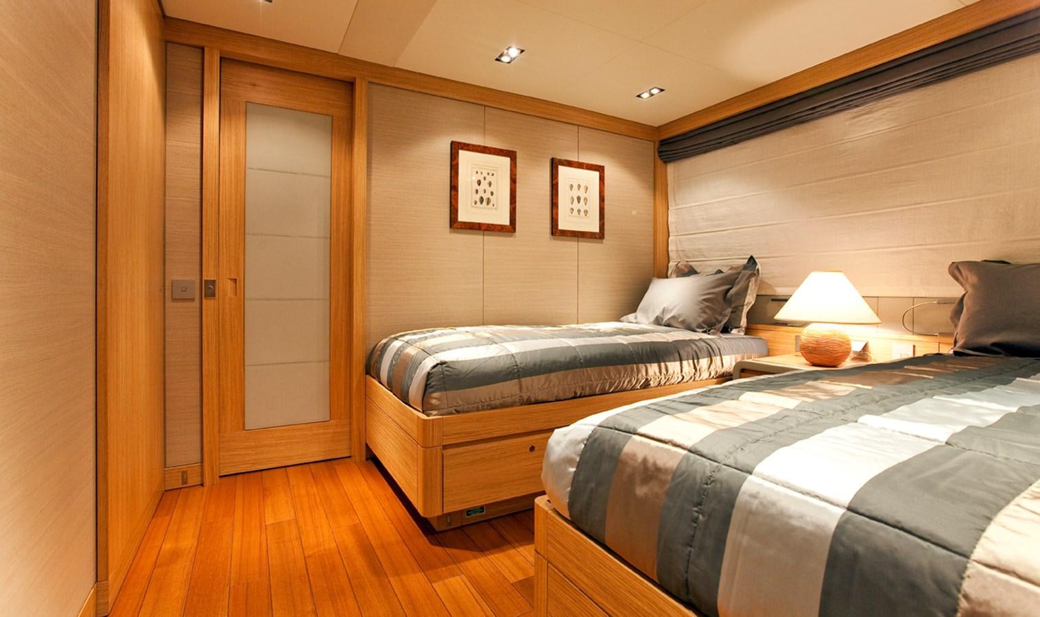 a couple of beds in a room aboard FALCO MOSCATA Yacht for Sale