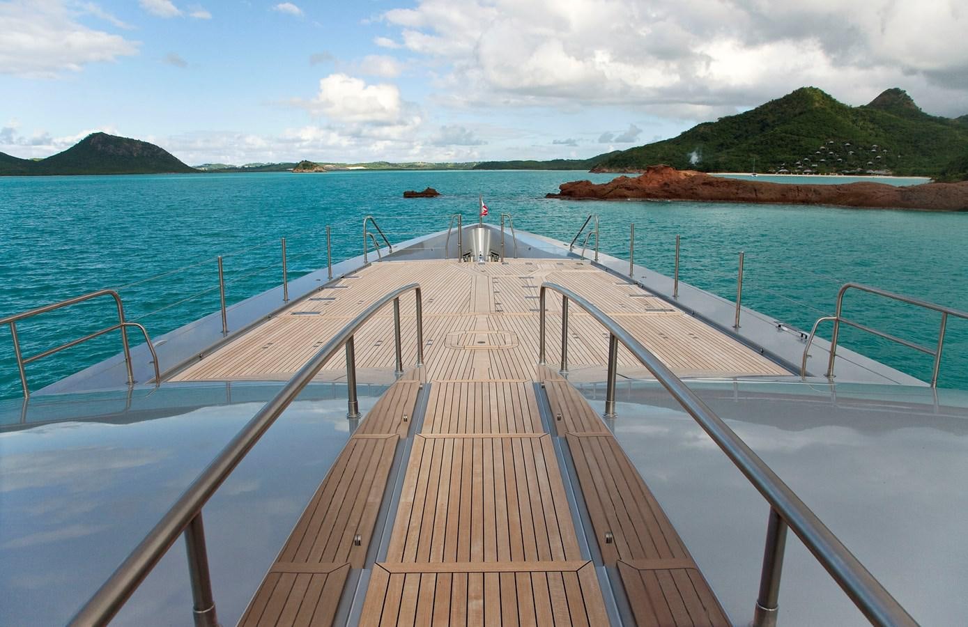 a wooden bridge over water aboard FALCO MOSCATA Yacht for Sale