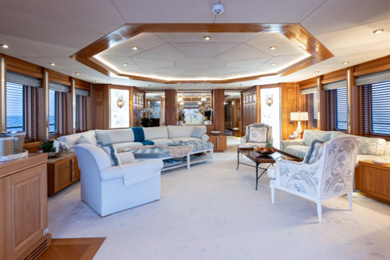 a large living room with a large open floor plan aboard VIBRANCE Yacht for Sale