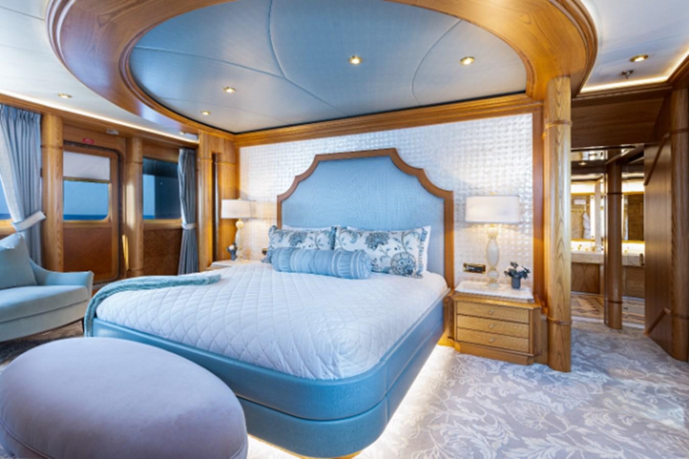 a large bed in a room aboard VIBRANCE Yacht for Sale