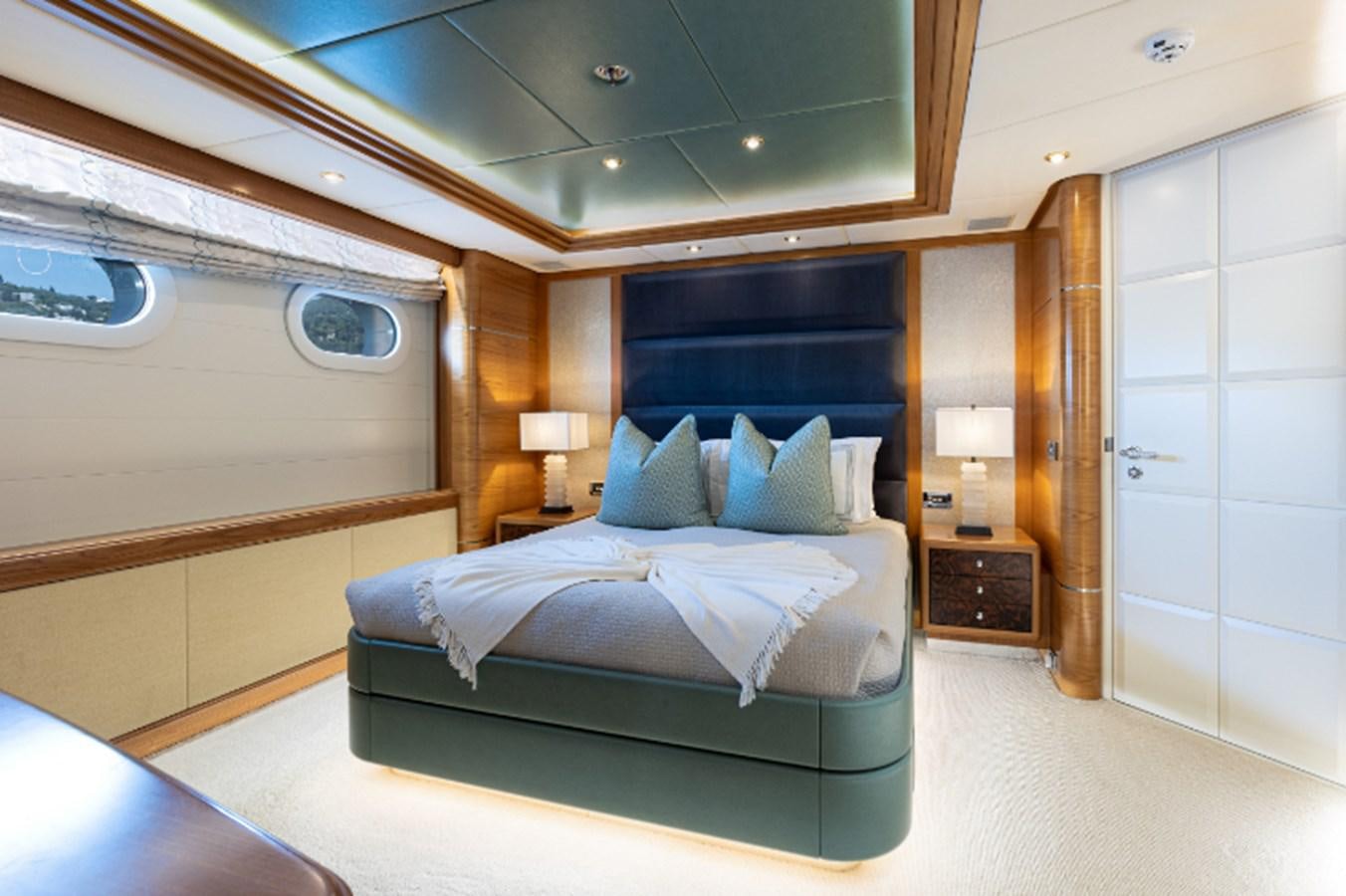 a bed in a room aboard VIBRANCE Yacht for Sale