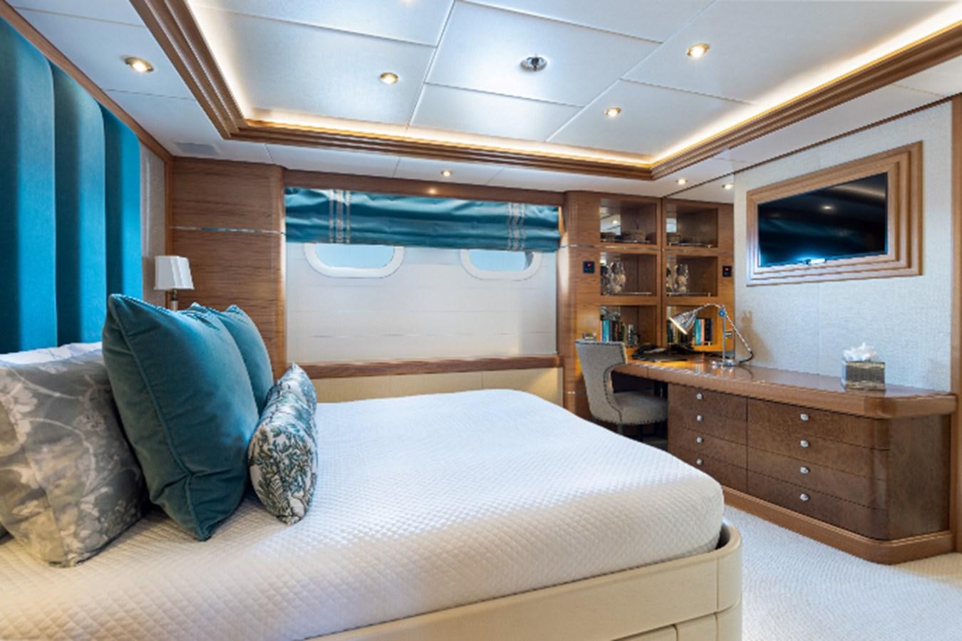 a bed in a room aboard VIBRANCE Yacht for Sale