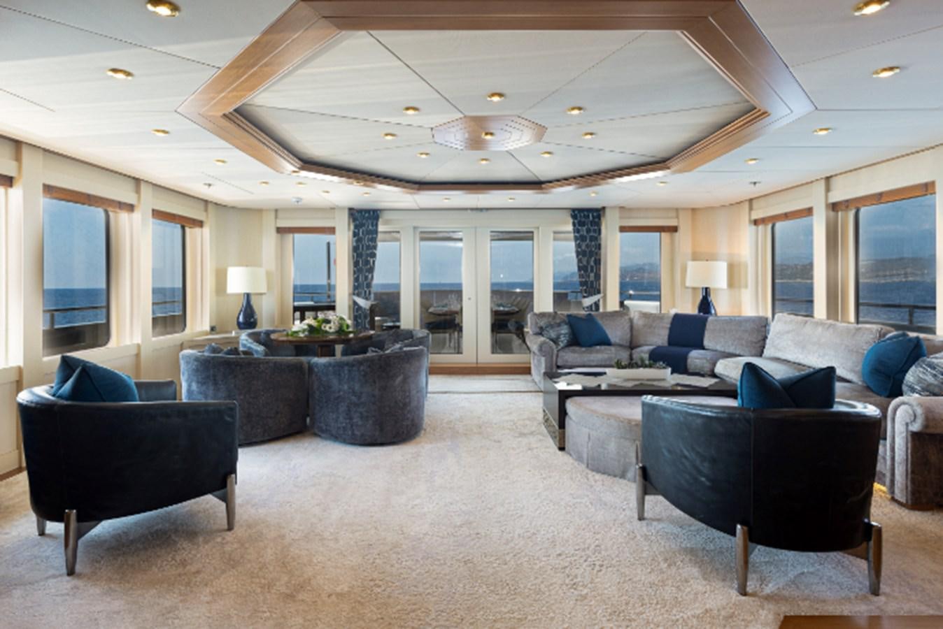 a large living room with a large open floor plan aboard VIBRANCE Yacht for Sale
