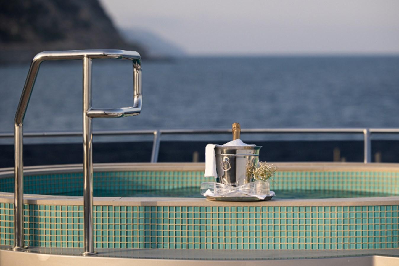 a glass jar on a table aboard VIBRANCE Yacht for Sale