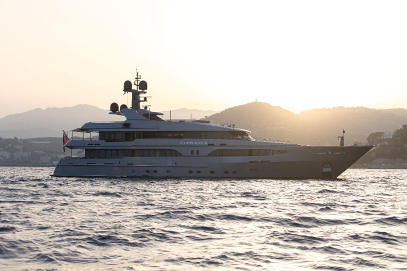 a large ship in the water aboard VIBRANCE Yacht for Sale