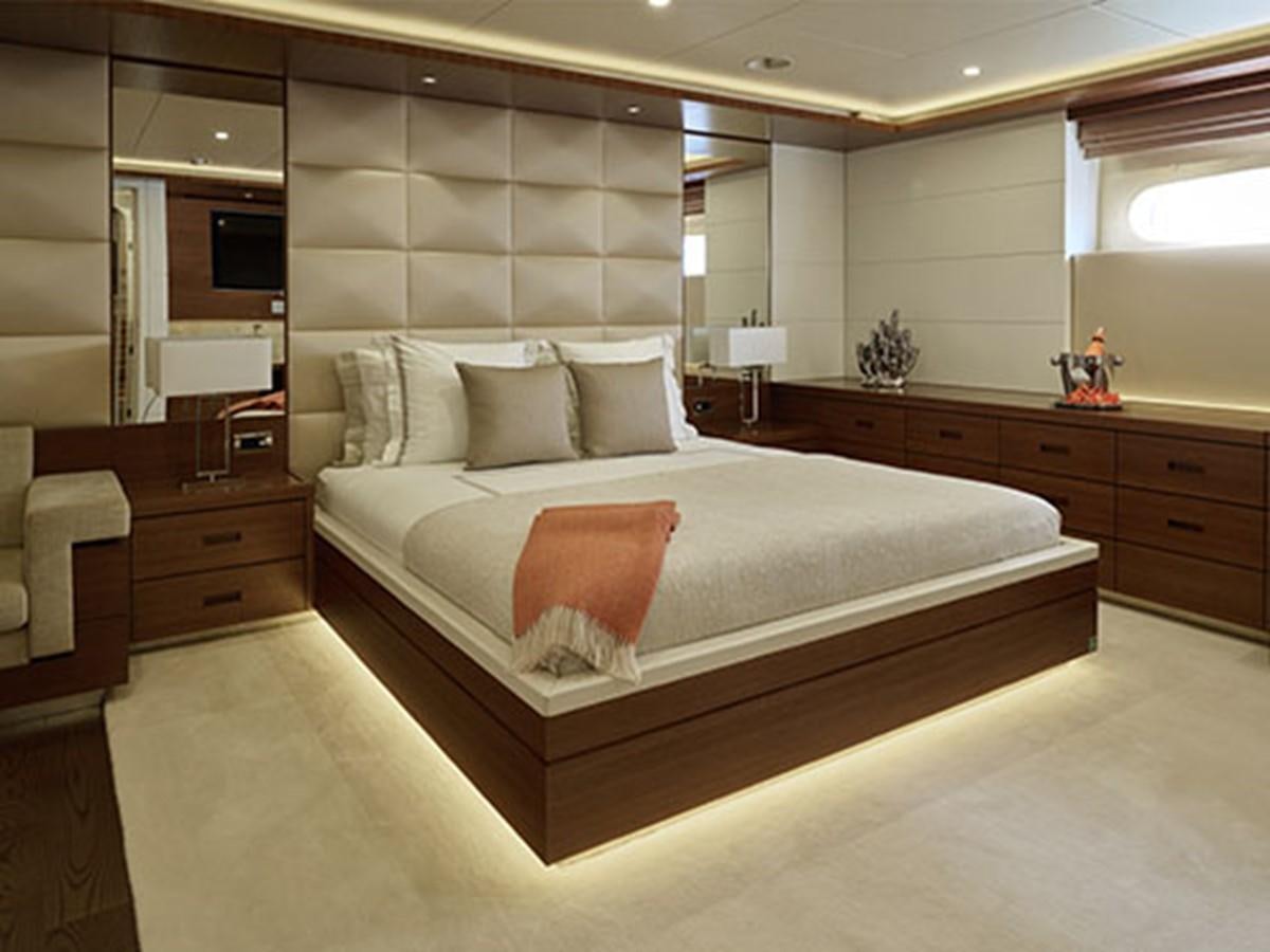 a bed in a room aboard NASSIMA Yacht for Sale
