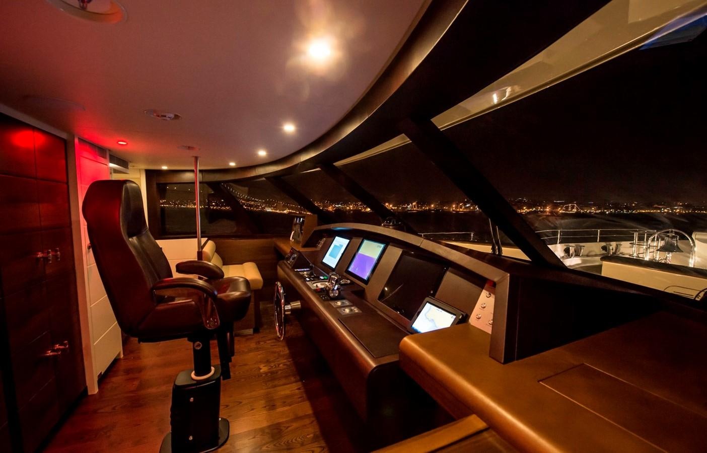 a room with a desk and computer aboard NASSIMA Yacht for Sale