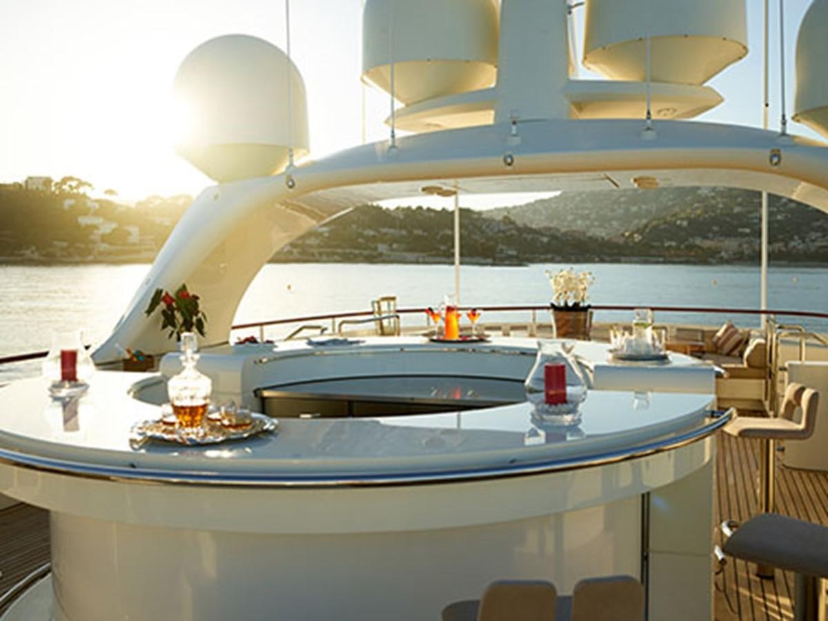 a table with food on it aboard NASSIMA Yacht for Sale