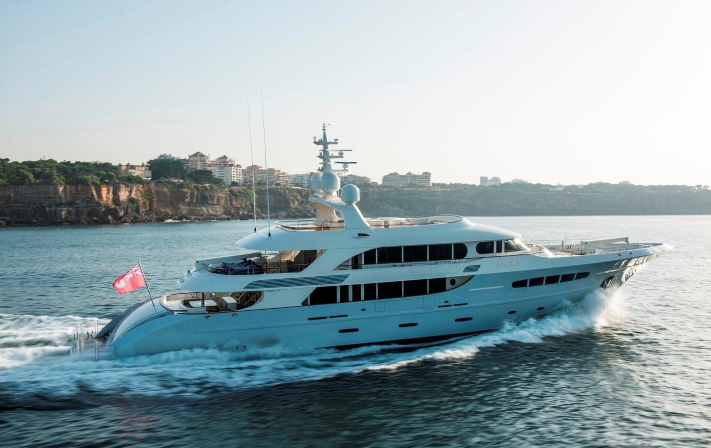 a boat on the water aboard NASSIMA Yacht for Sale
