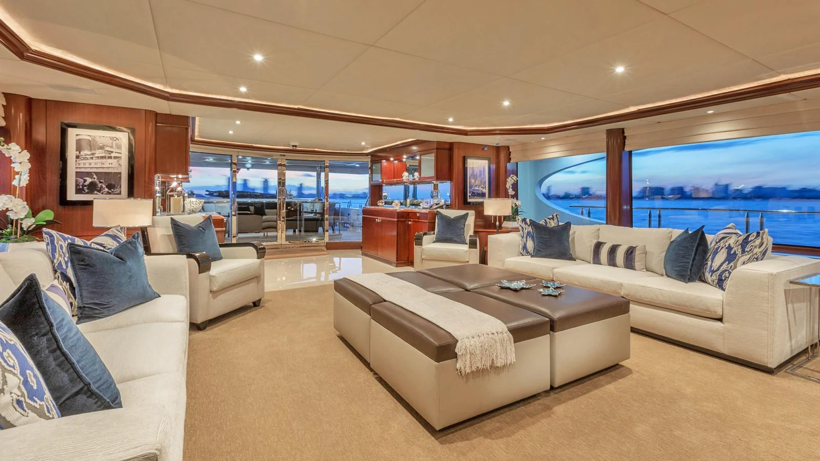 a living room with a large window aboard GLAZE Yacht for Sale