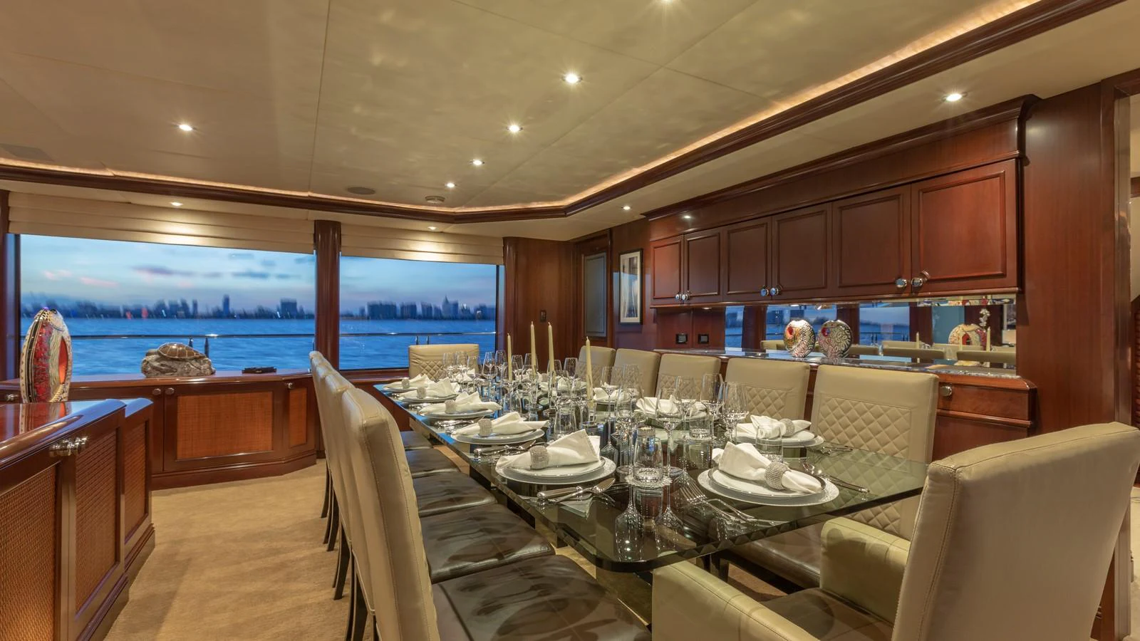a dining room with a large table aboard GLAZE Yacht for Sale