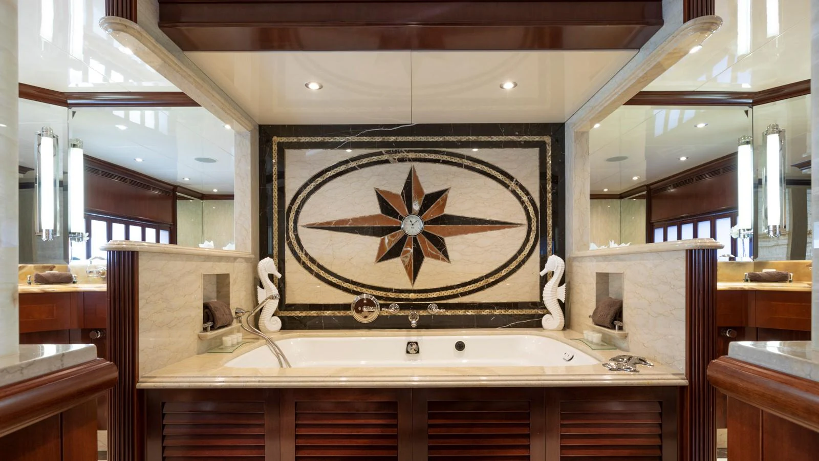 a large clock in a room aboard GLAZE Yacht for Sale