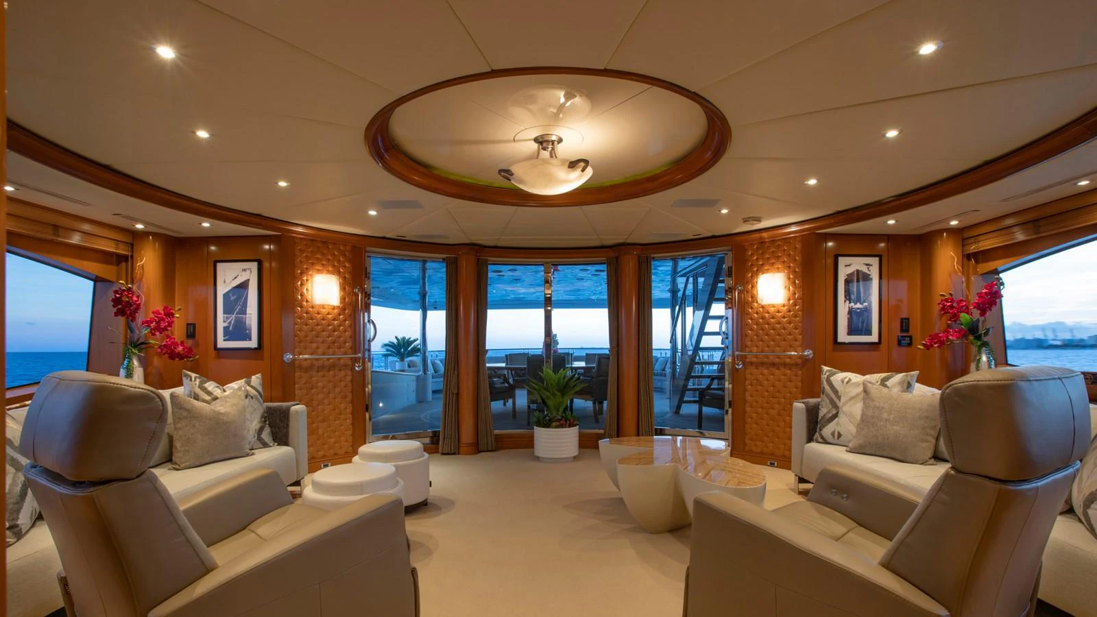 a living room with a large window aboard GLAZE Yacht for Sale