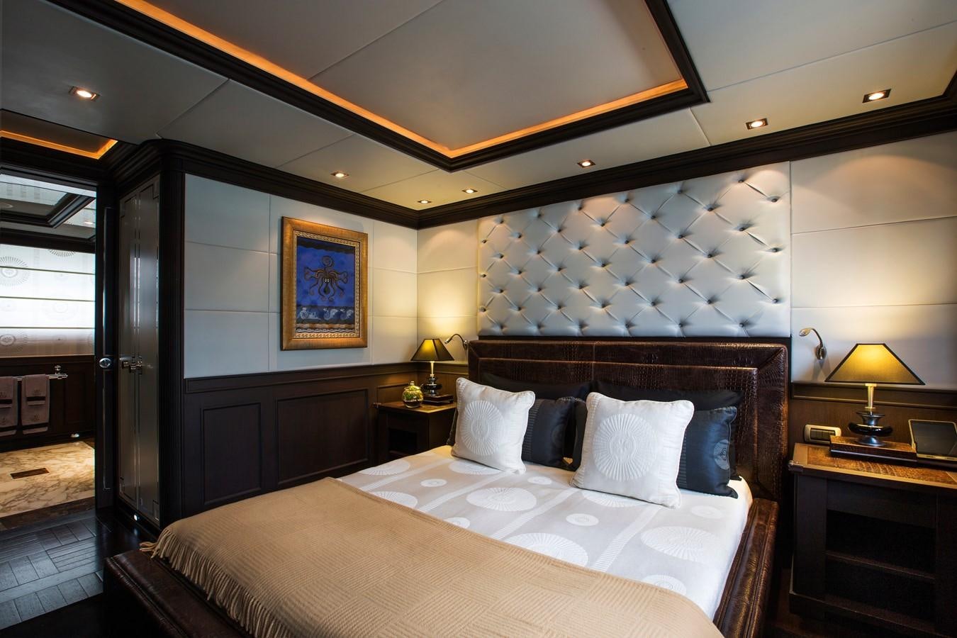 a large bed in a hotel room aboard AQUAMARINA Yacht for Sale
