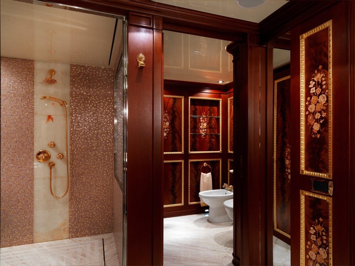 a bathroom with a glass shower aboard AQUAMARINA Yacht for Sale