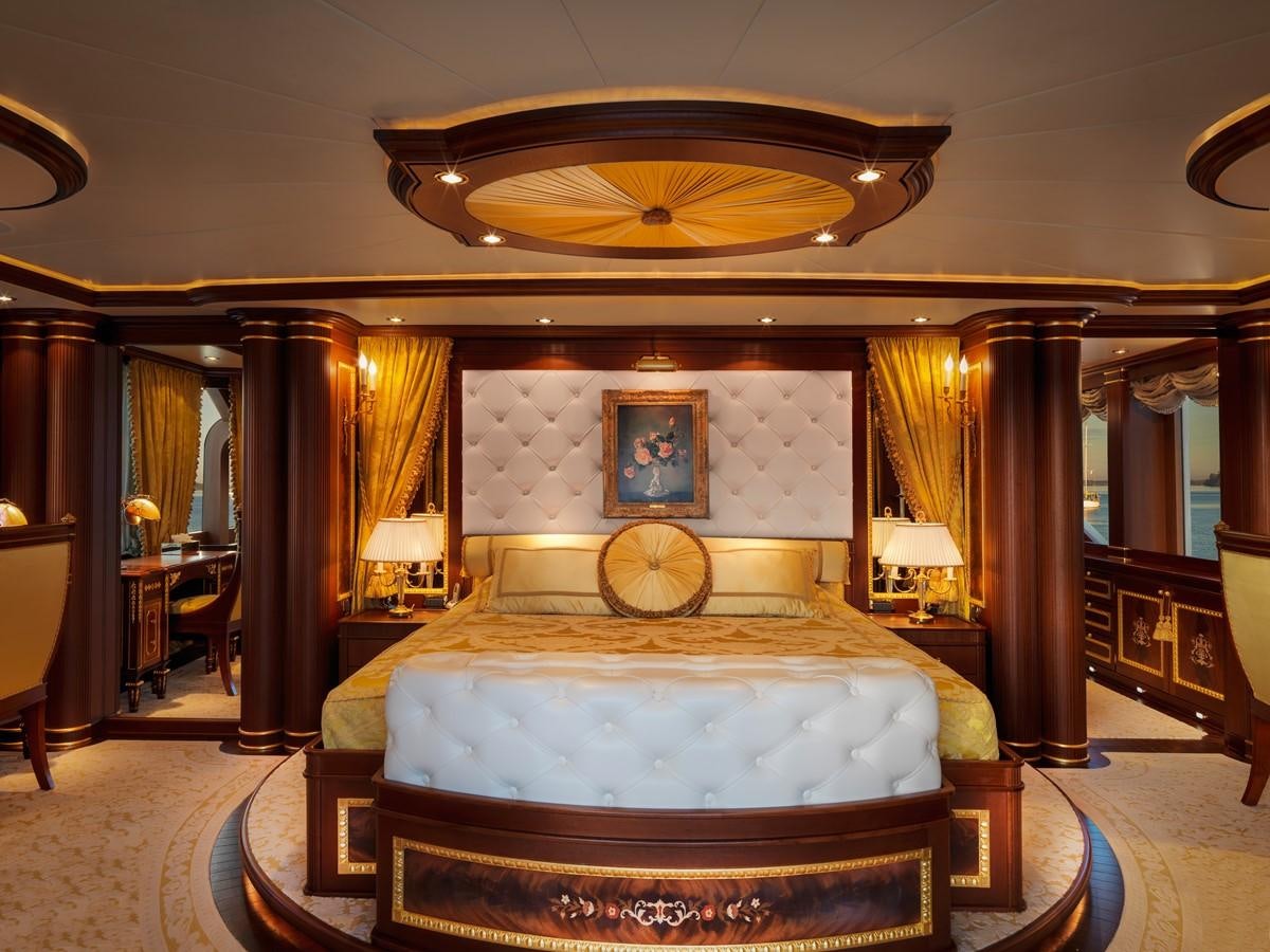 a large bedroom with a large bed aboard AQUAMARINA Yacht for Sale
