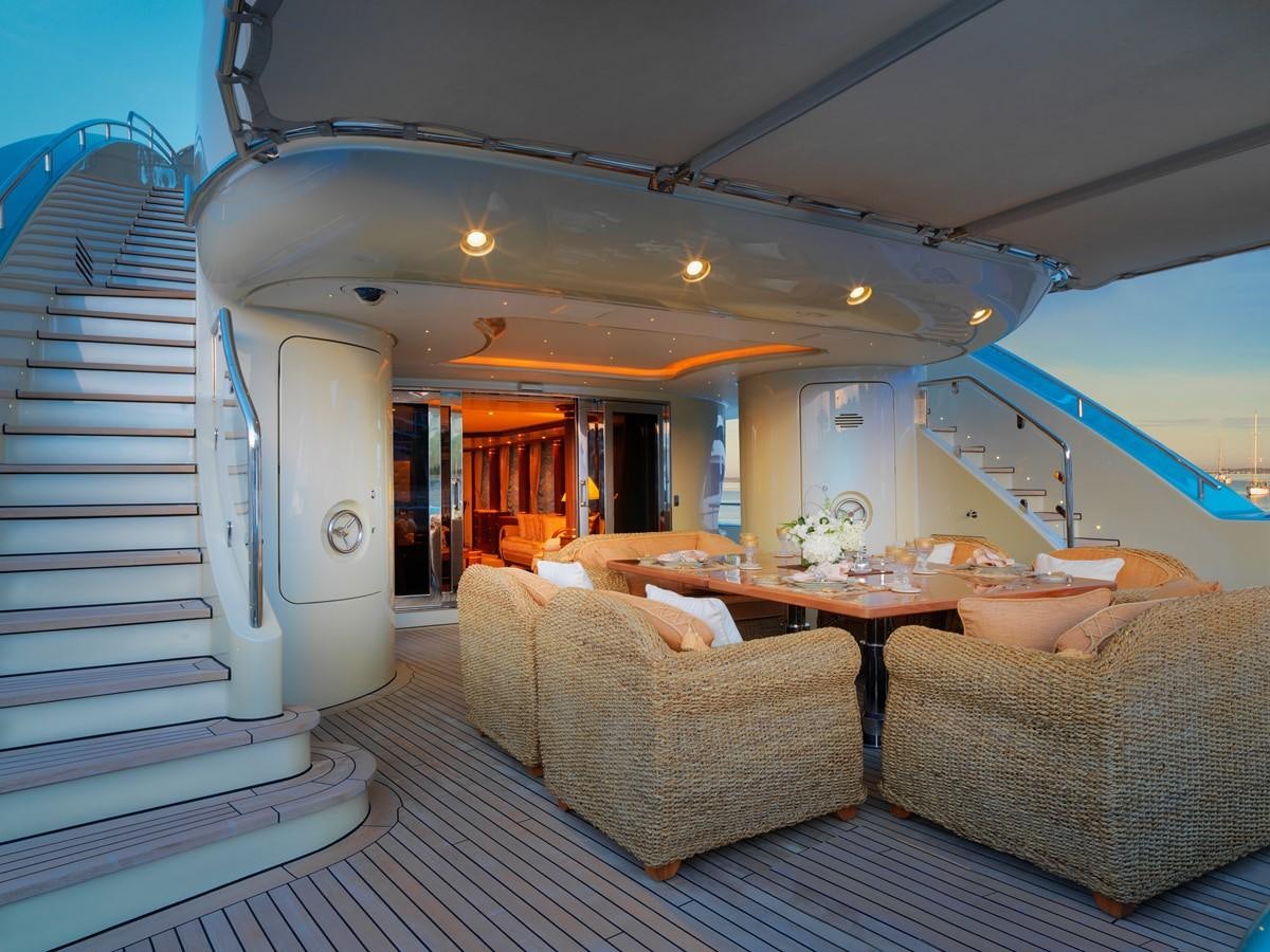 a living room with a staircase aboard AQUAMARINA Yacht for Sale