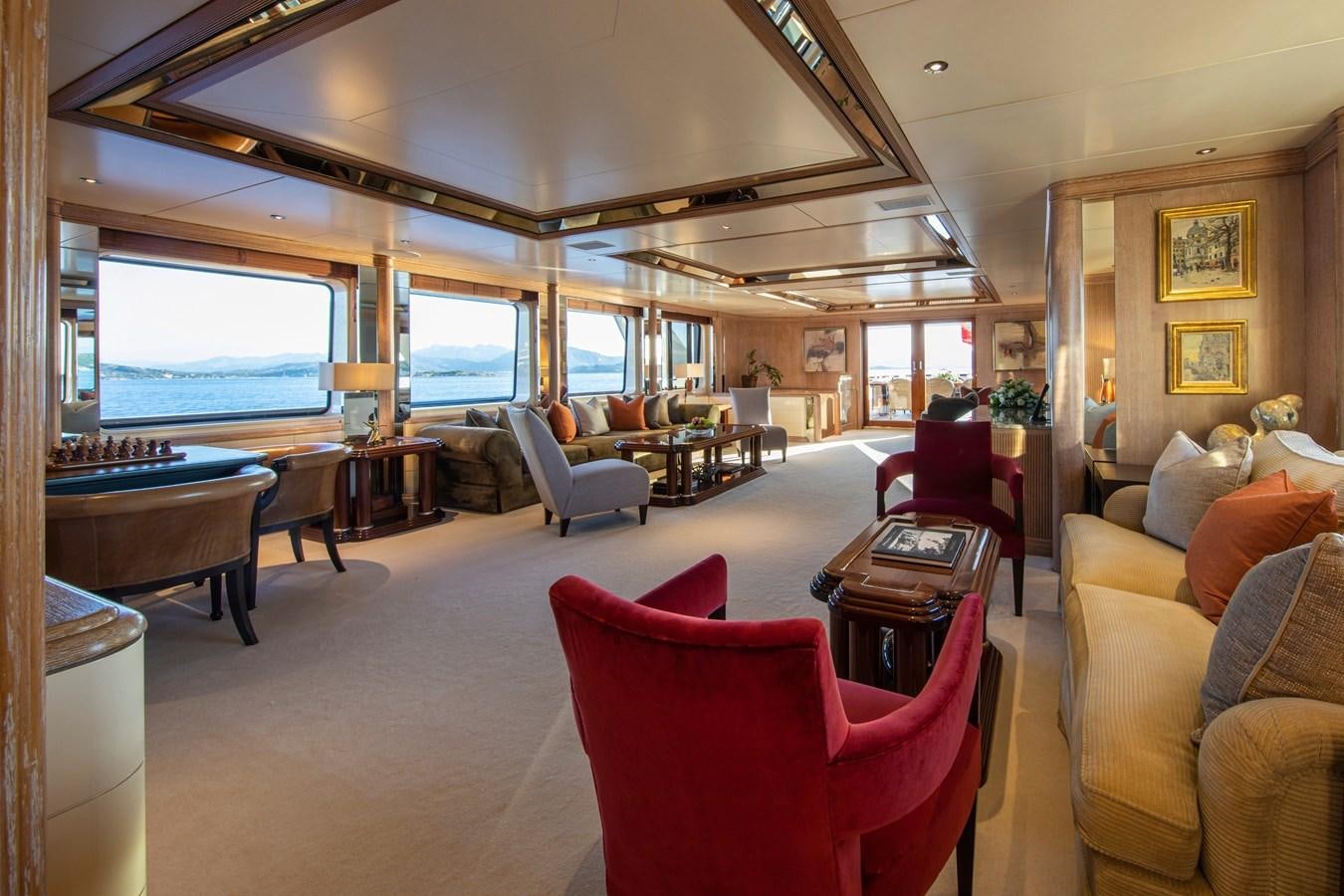 a living room with a large window aboard VA BENE Yacht for Sale