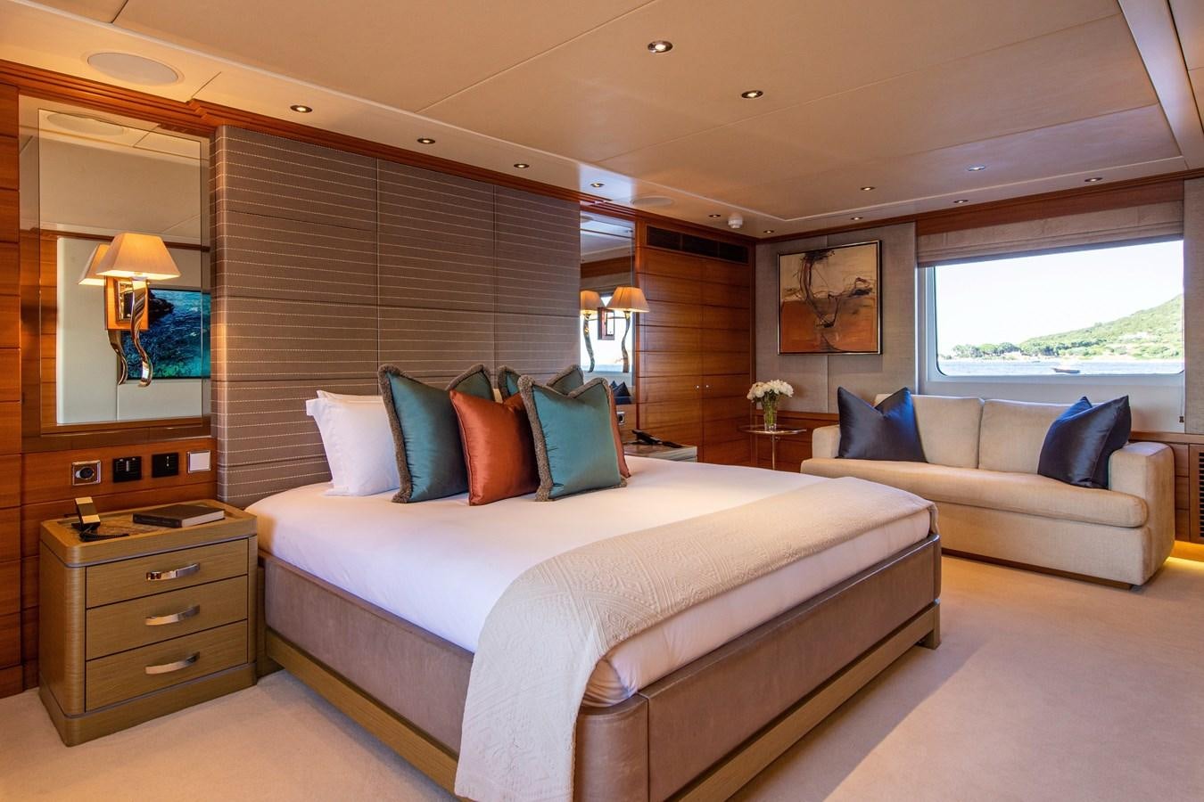 a bed in a room aboard VA BENE Yacht for Sale