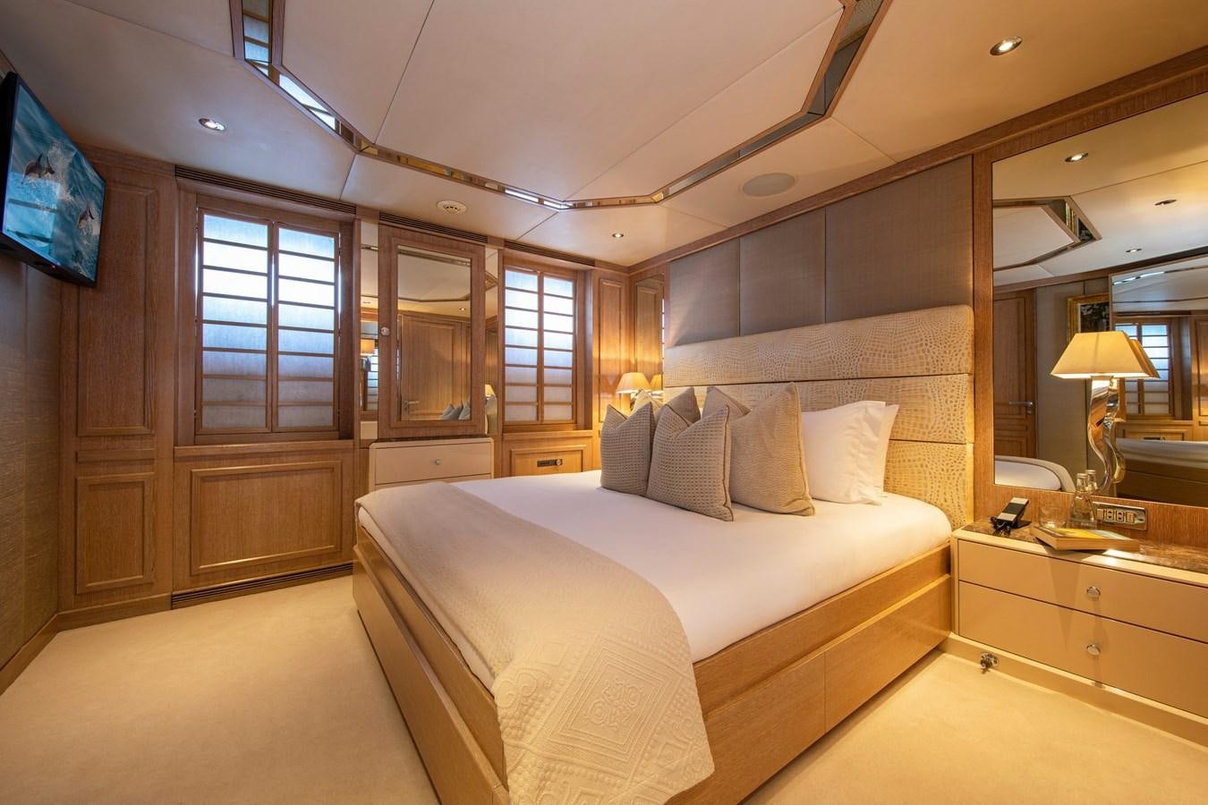 a bed in a room aboard VA BENE Yacht for Sale