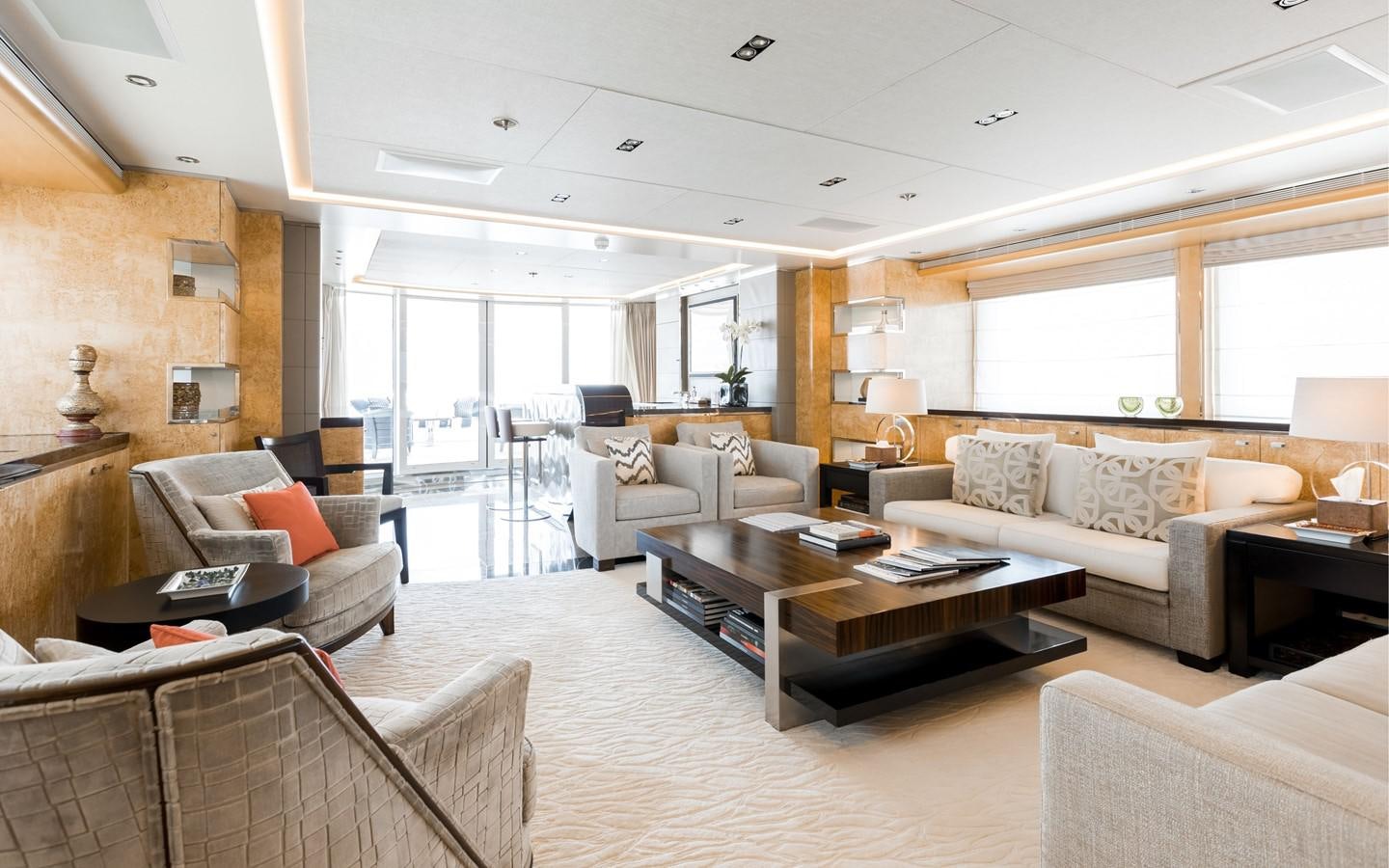 a living room with a large window aboard ATINA Yacht for Sale