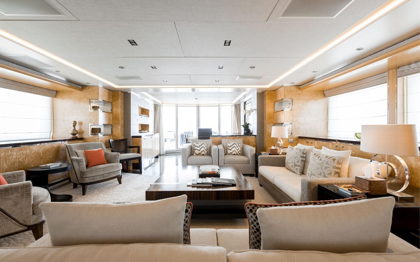 a living room with a large window aboard ATINA Yacht for Sale