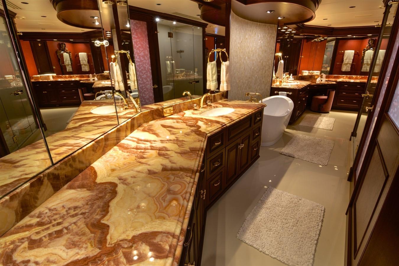 a bathroom with a large marble counter aboard SCORPIO Yacht for Sale
