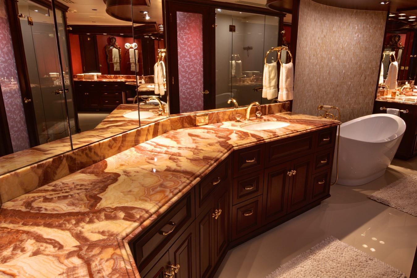 a bathroom with marble counter tops aboard SCORPIO Yacht for Sale