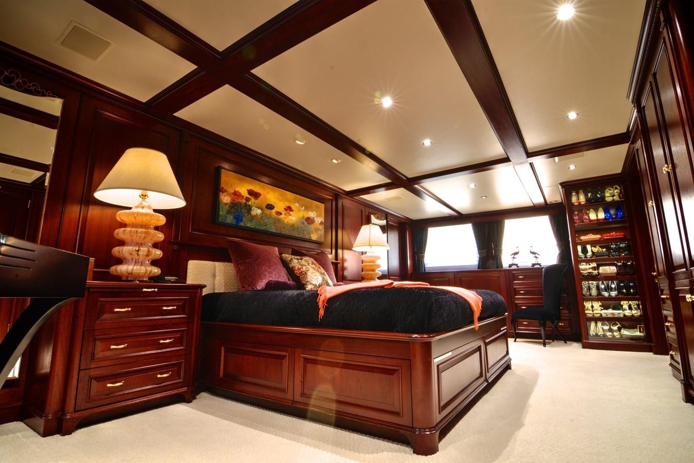 a large bedroom with a large bed aboard SCORPIO Yacht for Sale