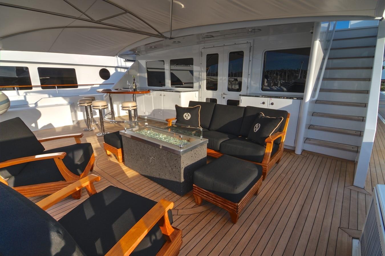 a living room with a couch and a table aboard SCORPIO Yacht for Sale