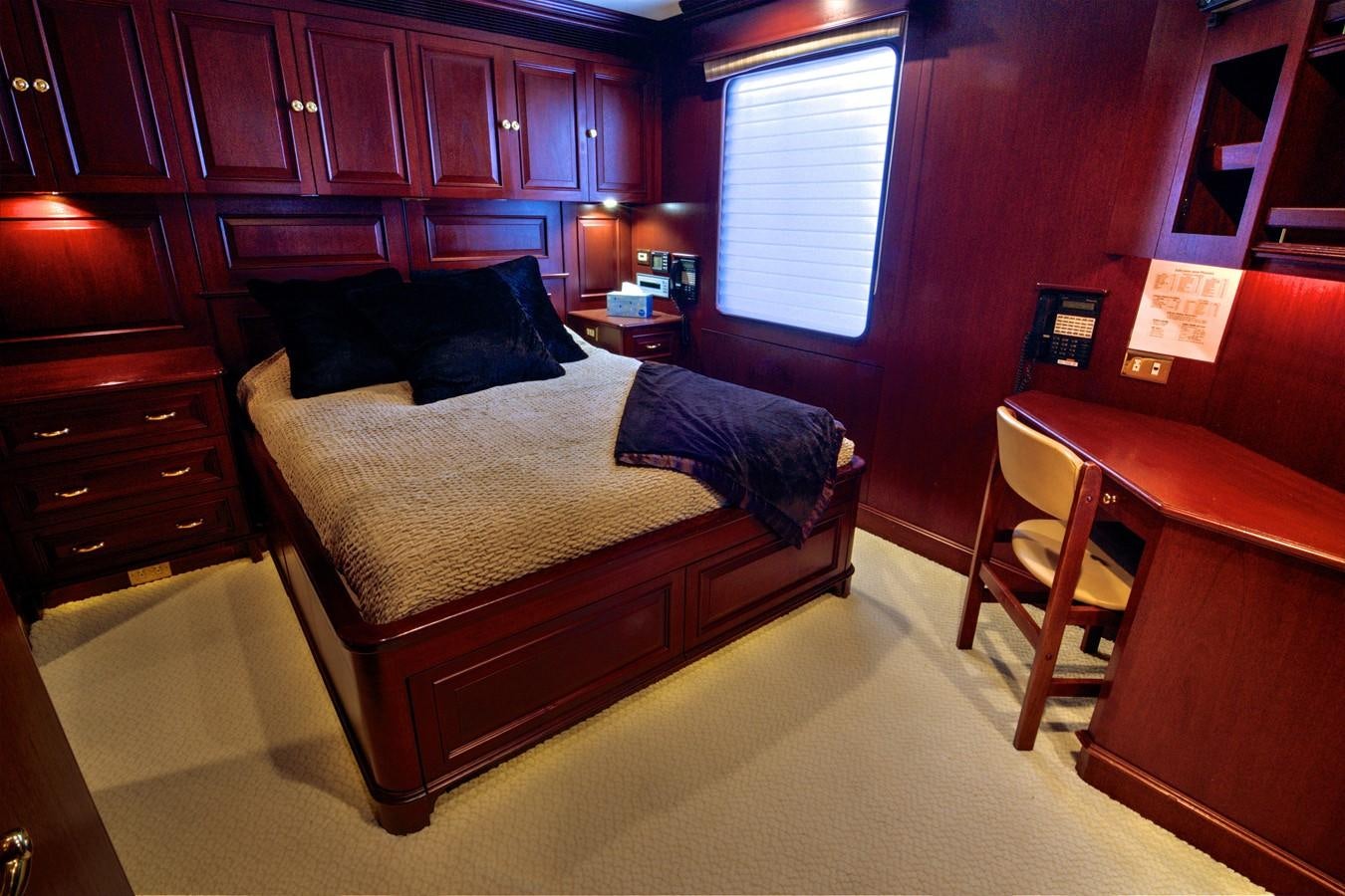 a bed in a room aboard SCORPIO Yacht for Sale