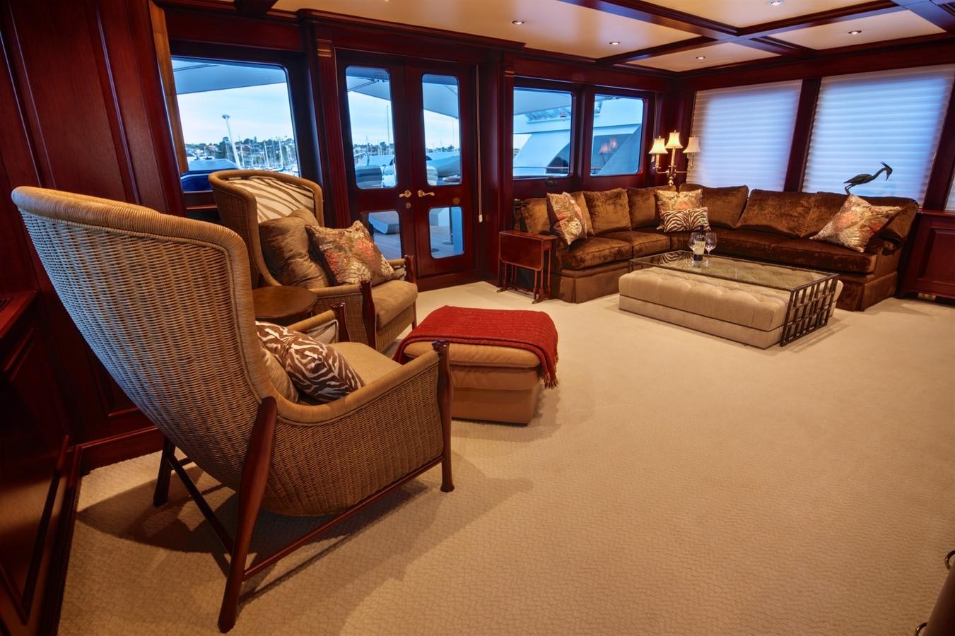 a living room with leather furniture aboard SCORPIO Yacht for Sale